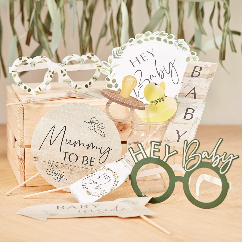 Ginger Ray Botanical Hey Baby Photo Booth Props on Wooden table display