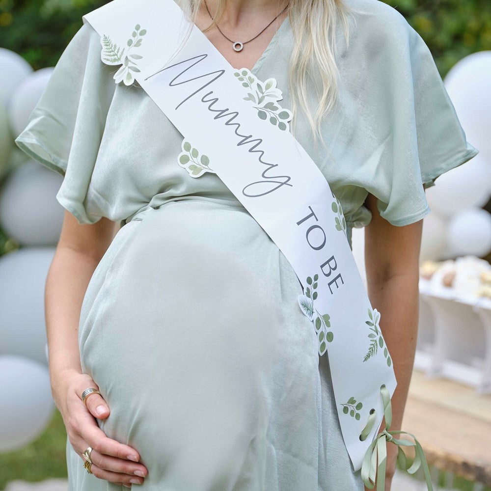 Ginger Ray Botanical Mummy To Be Sash on Pregnant Woman
