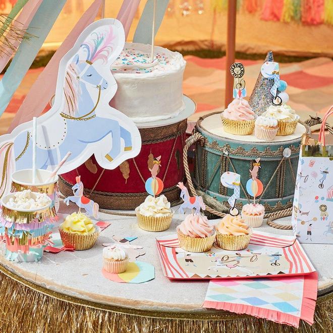 MeriMeri Circus Parade Cupcake Kit set up on table with other circus tableware 