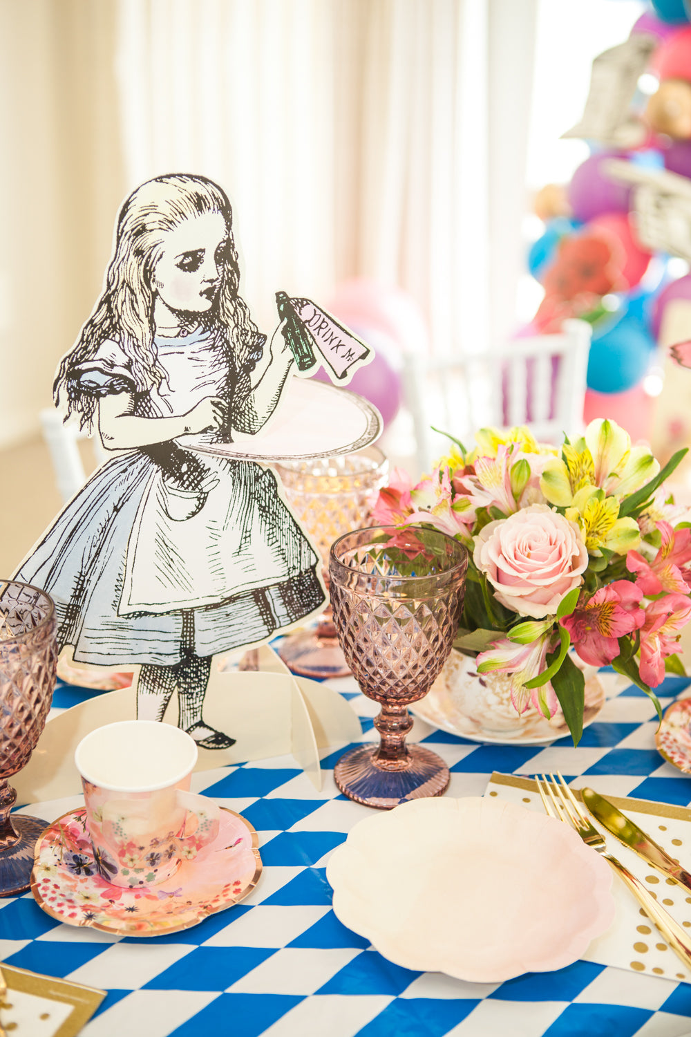 Alice in Wonderland Prop on the table with Flower  and tableware