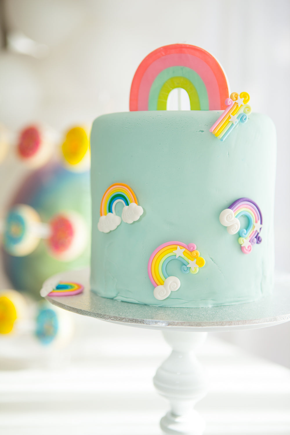 MeriMeri Large Rainbow Candle on cake