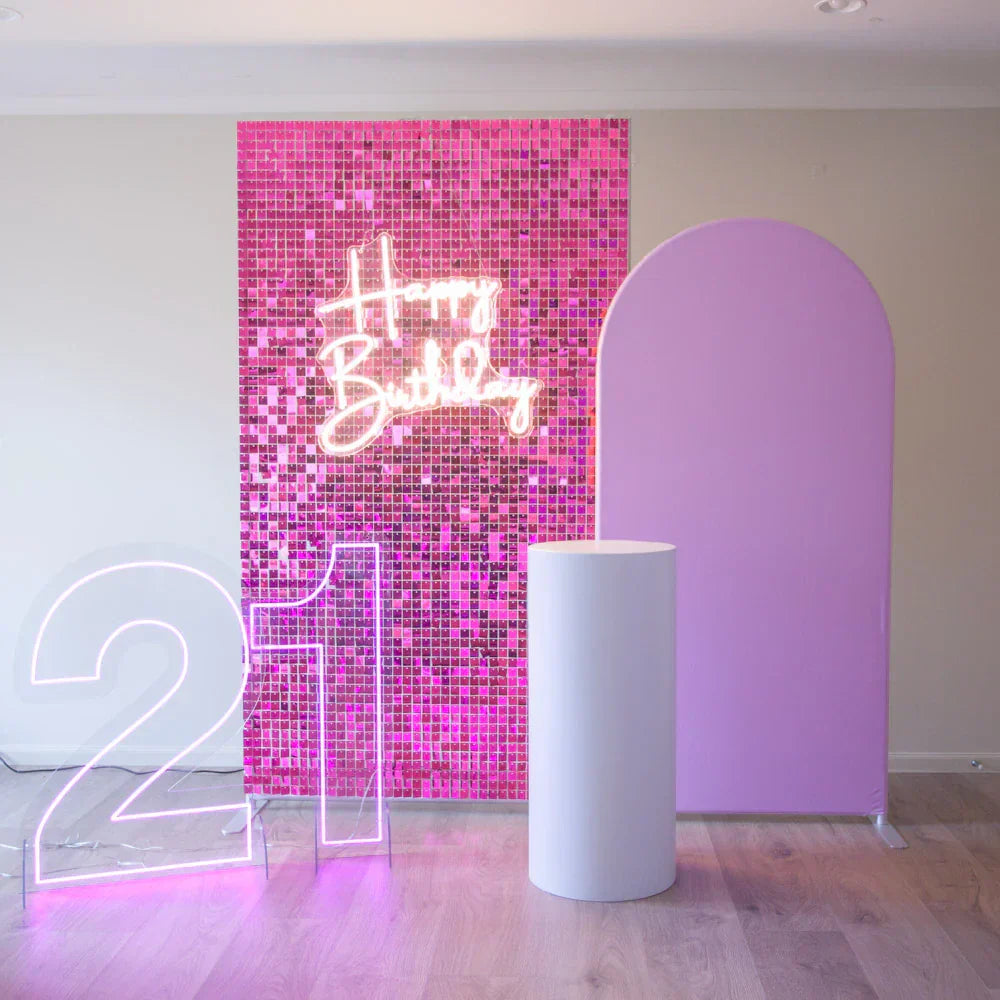 Barbie-inspired decors in hot pink shimmer wall and party backdrop 