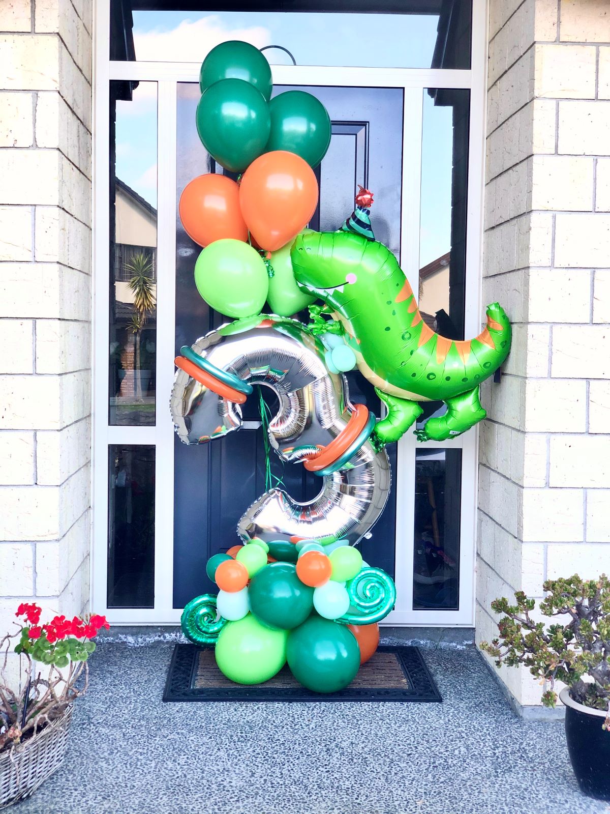 My Party Box Dinosaur Balloon Bouquet at front door