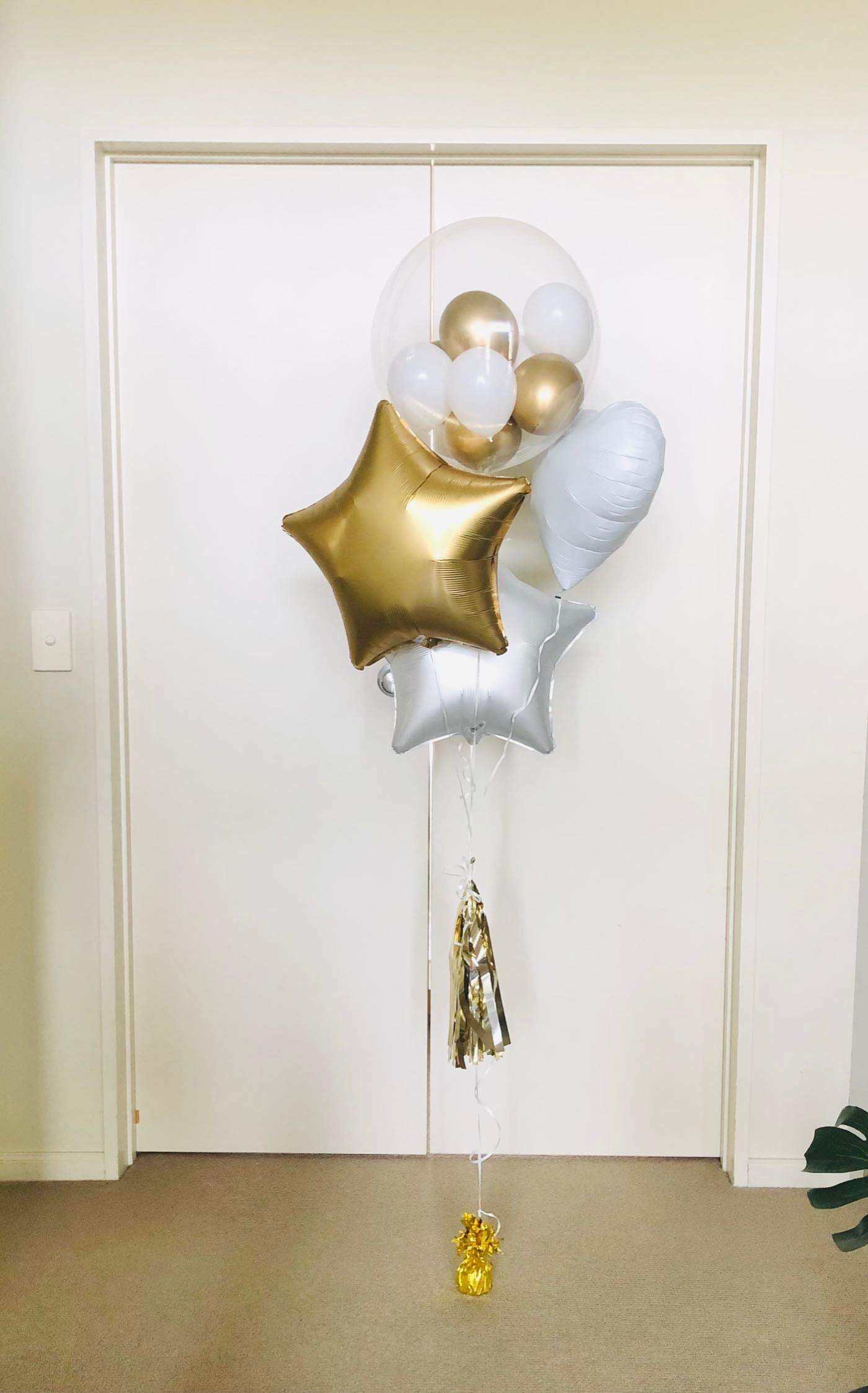 My Party Box Bubble Gum Bouquet with Clear Bubble balloon with mini balloon inside and gold foil star balloon, white foil star balloon and white lover heart balloon