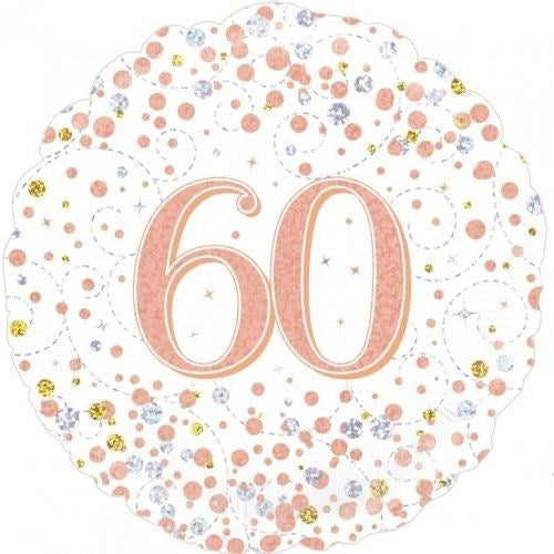 A round scalloped-edge party balloon with a white background, decorated with pink, silver, and gold confetti dots and the number '60' in pink glittery font in the center.
