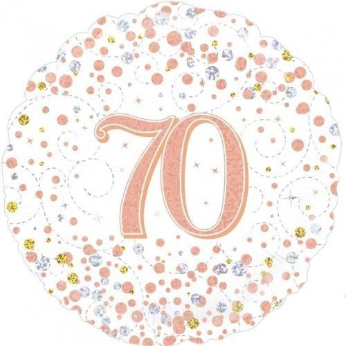 A scalloped round foil balloon for a 70th birthday, featuring a large glittery rose gold number '70' in the center, surrounded by scattered rose gold, silver, and gold confetti dots on a white background.
