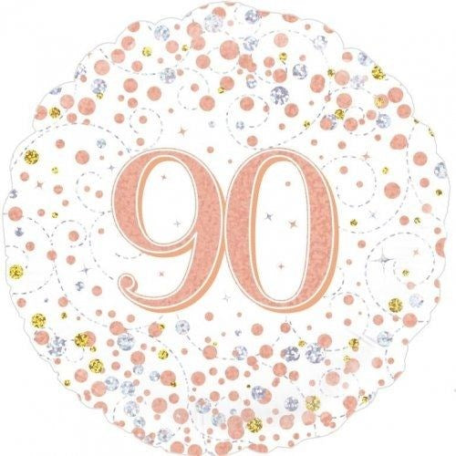 A round scalloped foil balloon with a white background, decorated with pink, gold, and silver glitter confetti and the number '90' in the center.