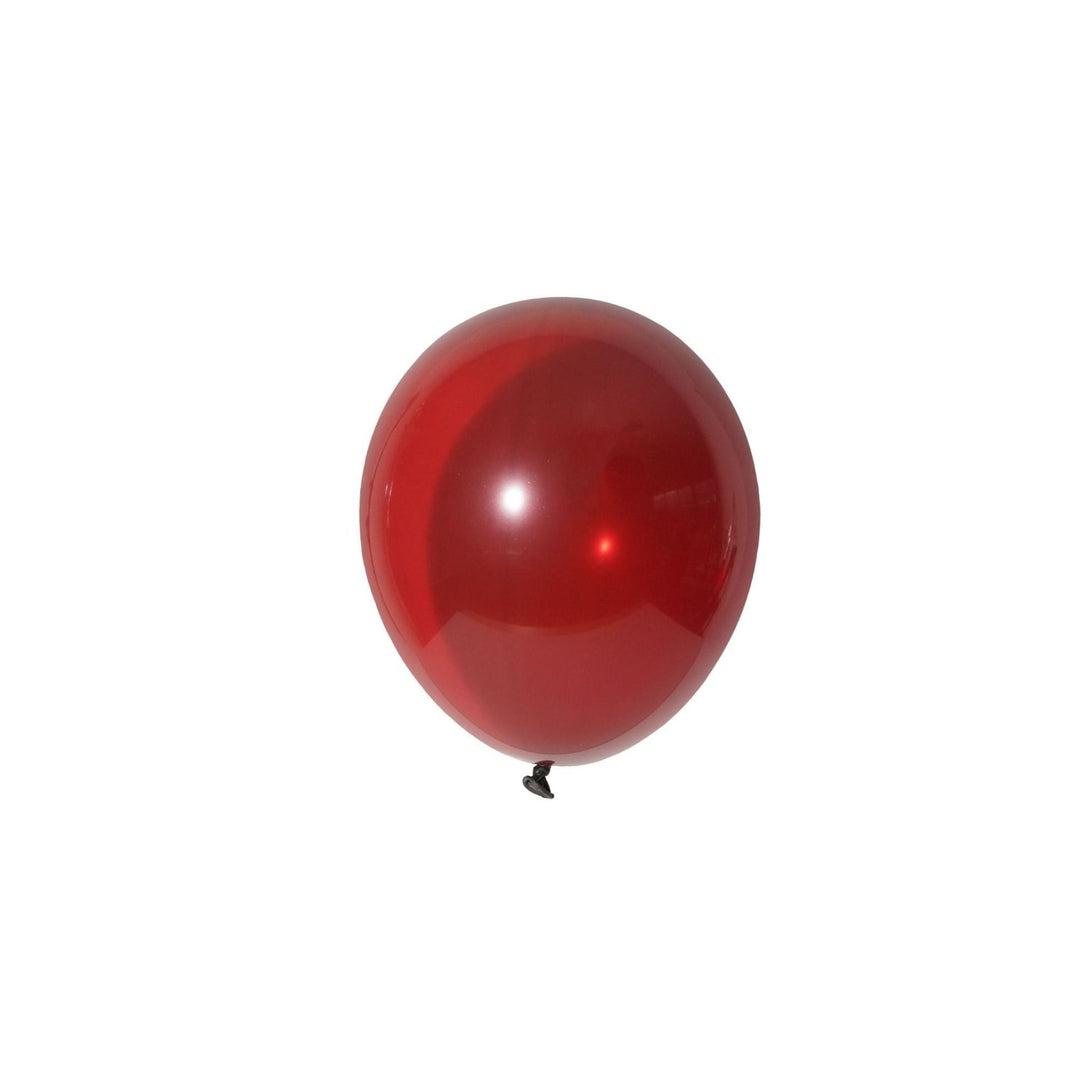 A single glossy red balloon floating against a solid white background.