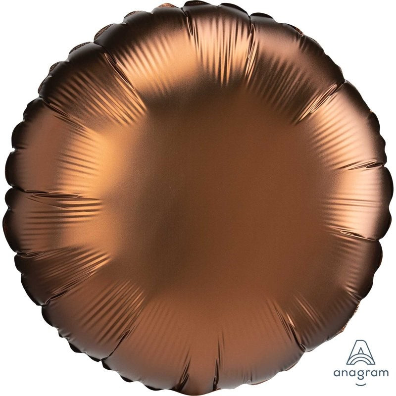 A round metallic foil balloon in a rose gold color, shown against a plain white background with a small 'anagram' brand logo in the bottom right corner.