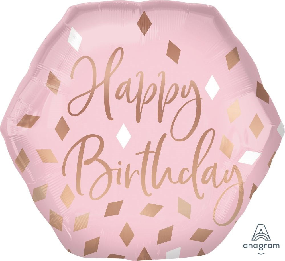 A pink foil balloon with 'Happy Birthday' written in rose gold script, decorated with rose gold and white diamond confetti, on a white background with an Anagram logo in the bottom right corner.