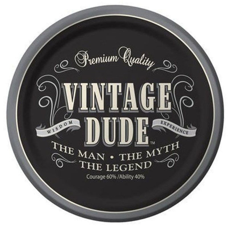 A round black paper party plate with "Vintage Dude" in a classic white font, featuring the slogans "The Man, The Myth, The Legend" and "Premium Quality."