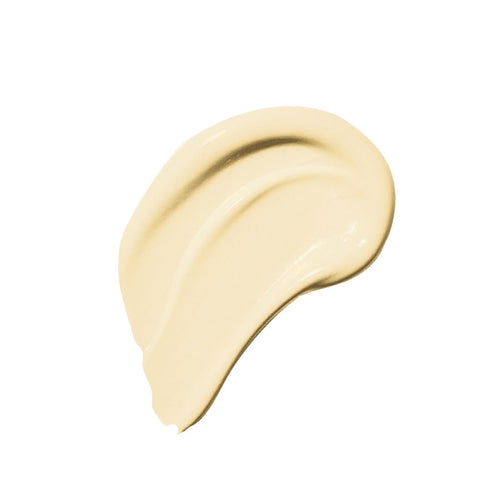 Creamy beige cosmetic product smear on white background.