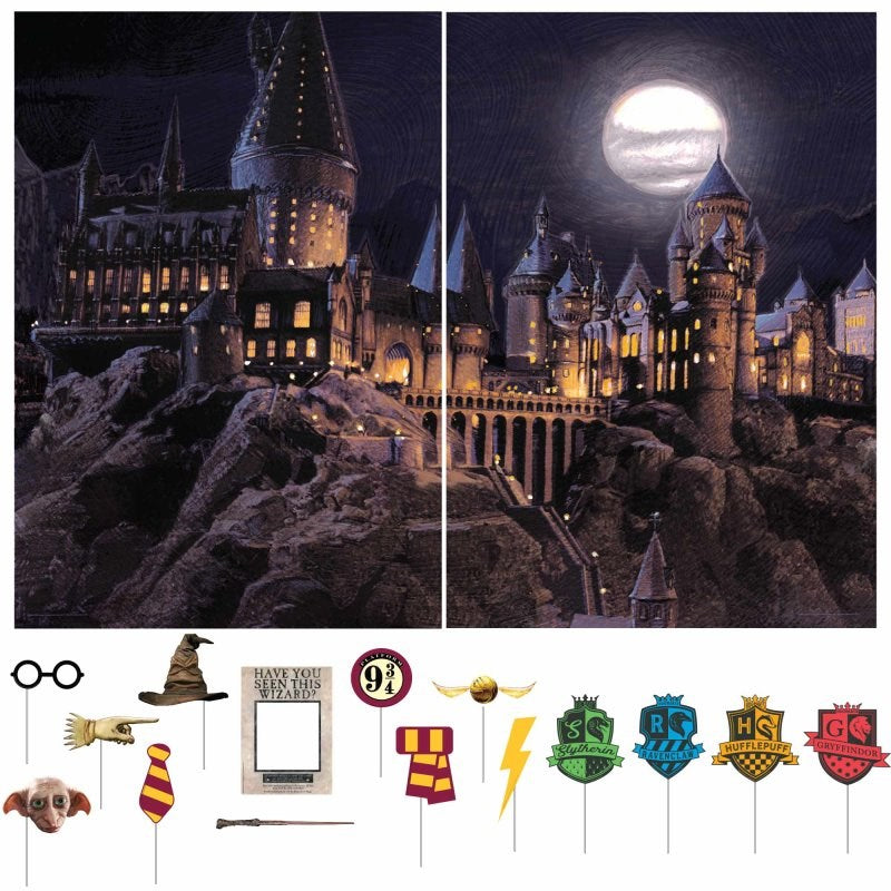 Two views of a castle at night with decorative props below.