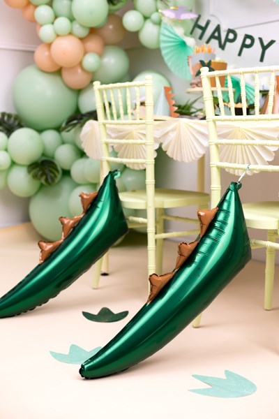 Green Dinosaur tail balloon hang on a kid's chair