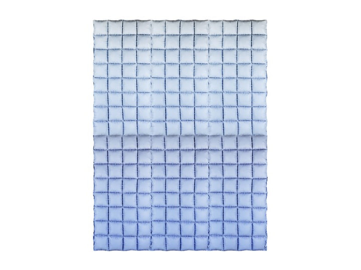 Blue and white checkered blanket on a white background