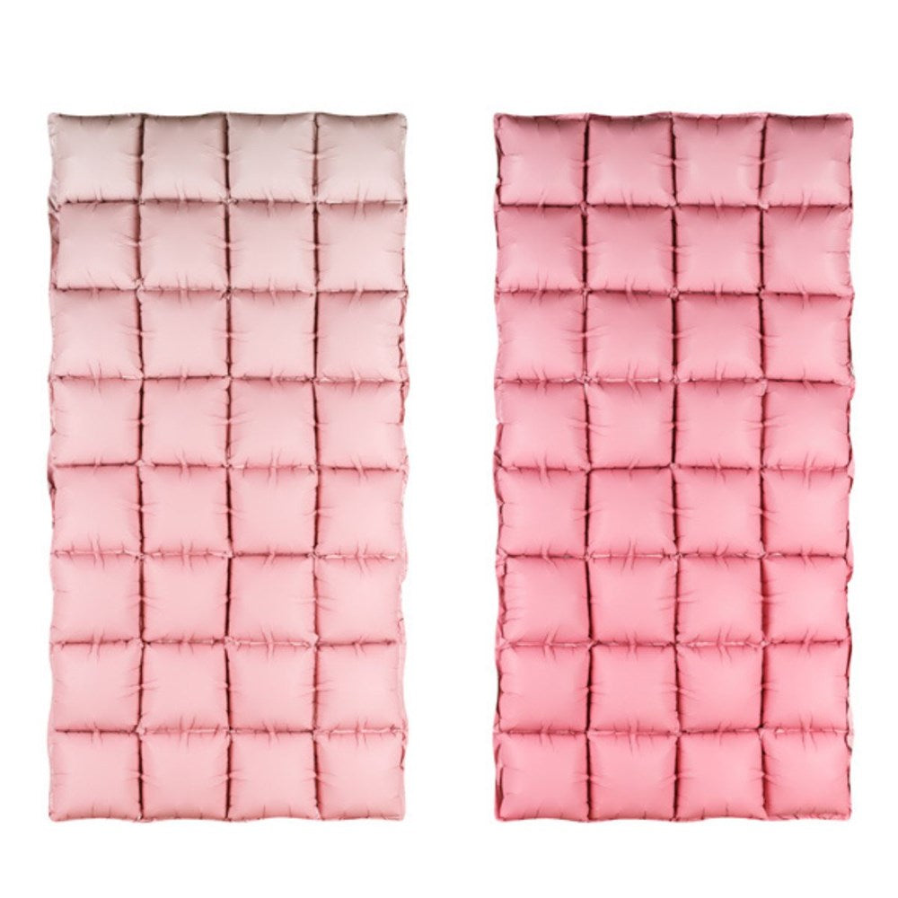 Two pink quilted panels on a white background