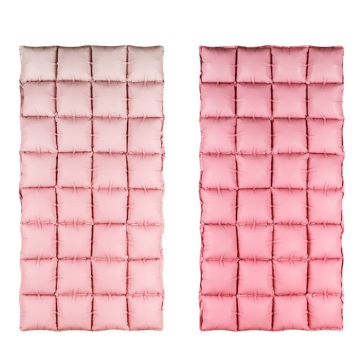 Two pink quilted panels on a white background