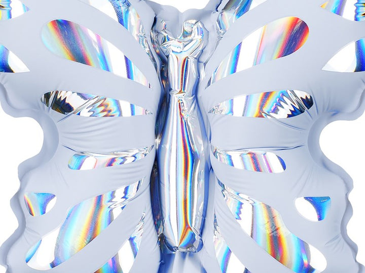 Butterfly-shaped object with rainbow iridescence on a white background