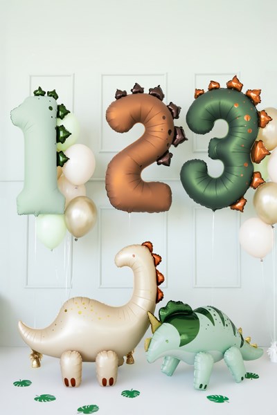Dinosaur-themed balloons with numbers and shapes on a white background