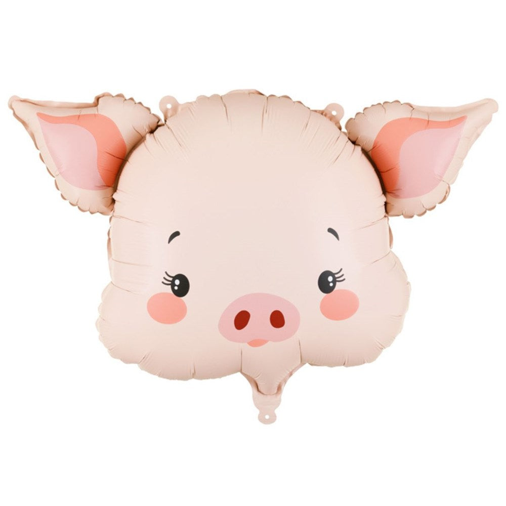 Pink pig-shaped balloon on a white background