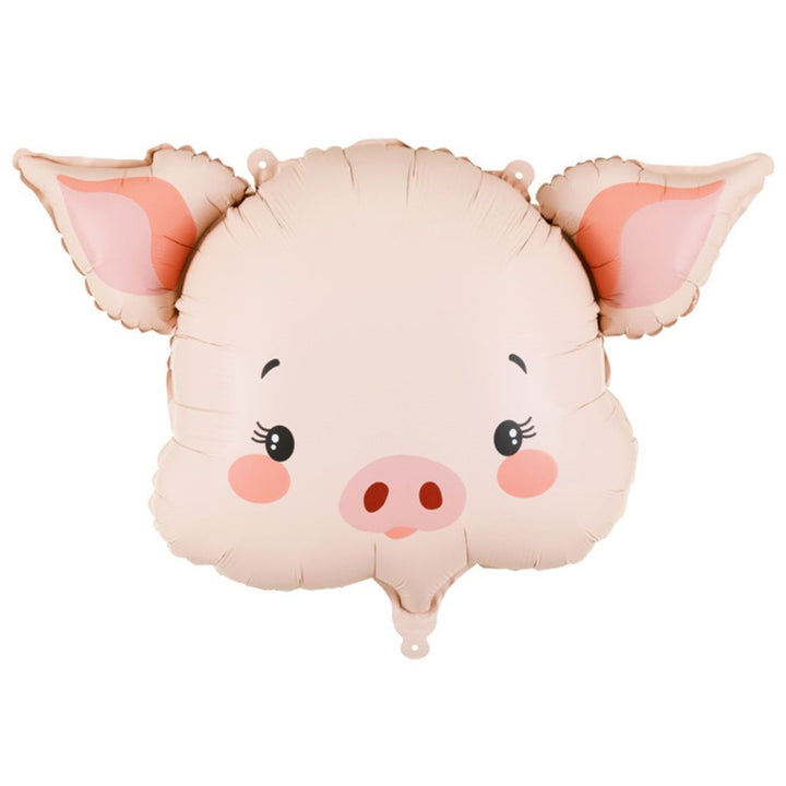 Pink pig-shaped balloon on a white background