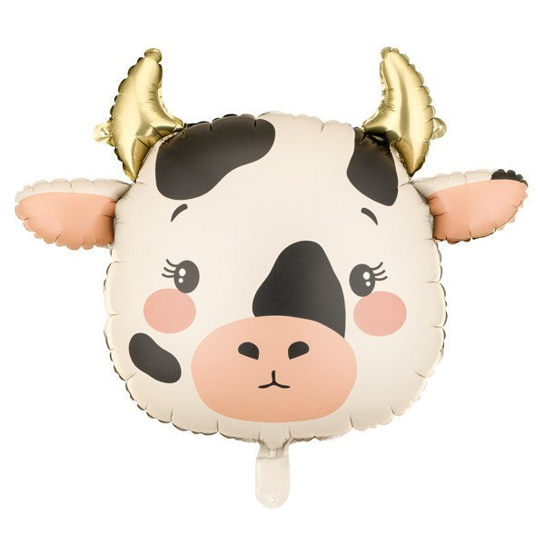 Cow-shaped balloon with a face on a white background