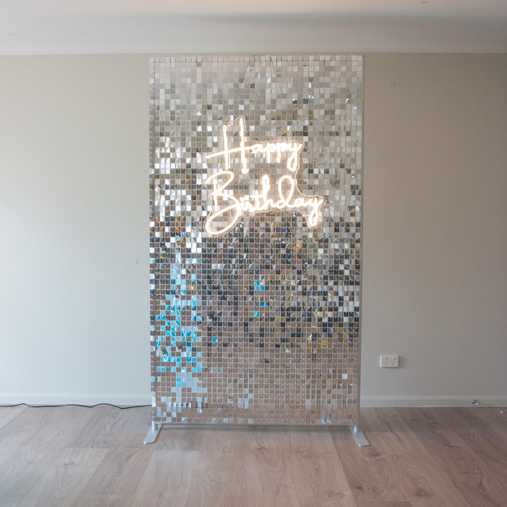 Silver Shimmer Wall with Happy Birthday Neon Light