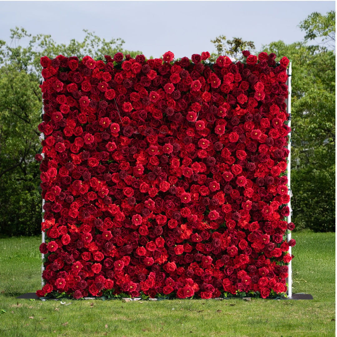 Wall of red flowers in a garden setting