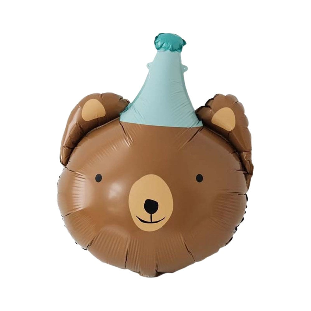 A foil balloon shaped like a bear's head wearing a light blue party hat, isolated on a white background.