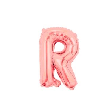 A metallic rose gold foil balloon in the shape of the letter R.