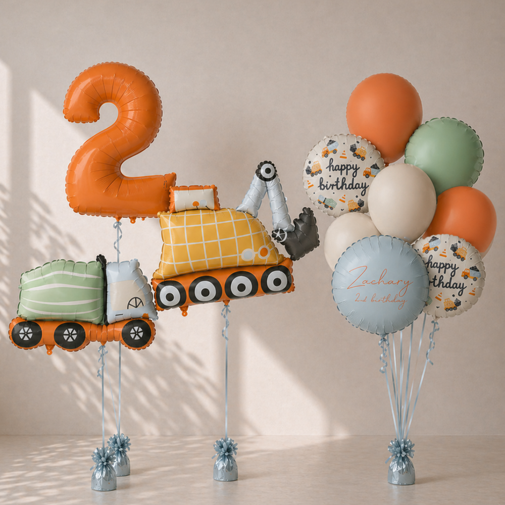 Construction-themed birthday balloon set with number 2, truck, and personalized balloons on a neutral background.