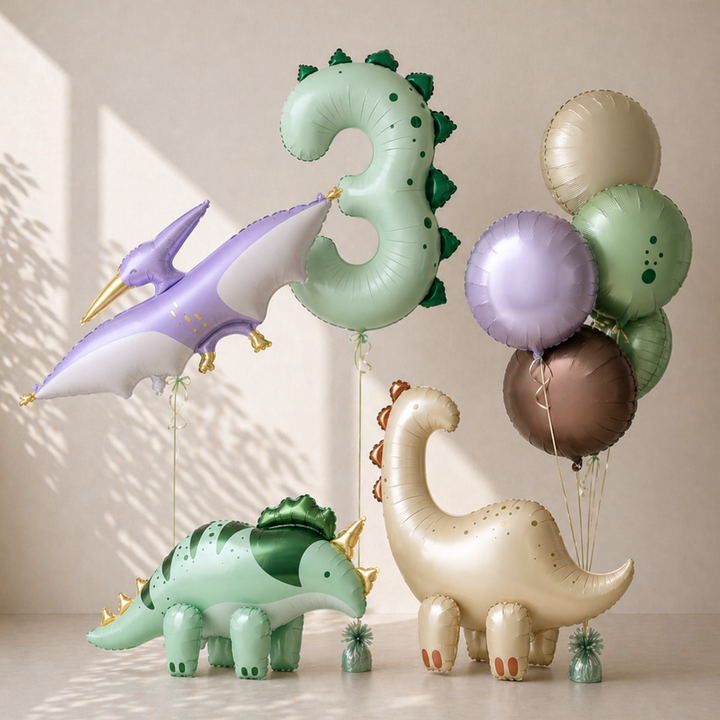 Dinosaur-themed balloons including a number '3' and various colors on a neutral background