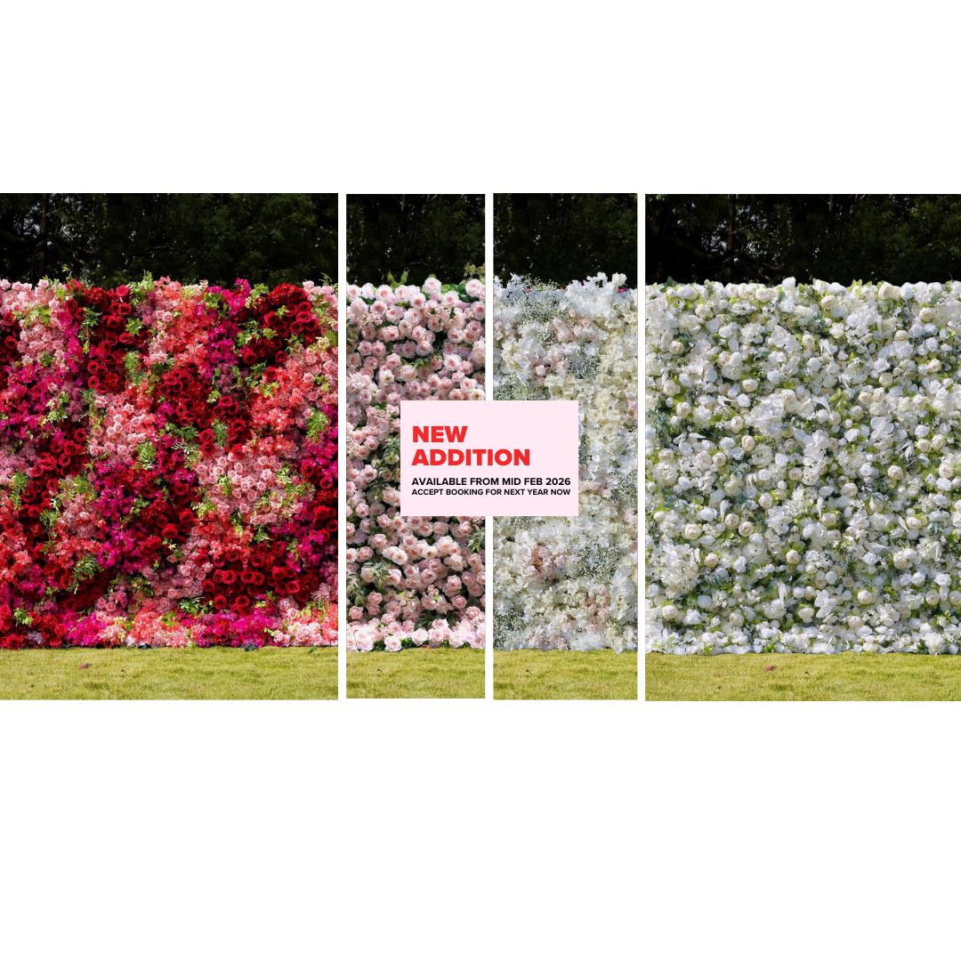 Three panels of floral walls with a 'New Addition' sign in the center.