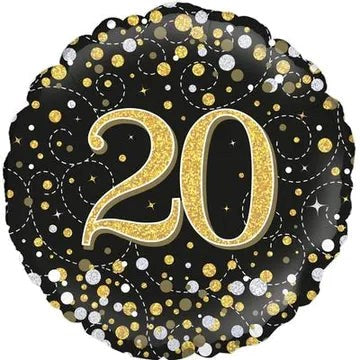 Decorative balloon with gold number '20' on a black background with gold and silver dots