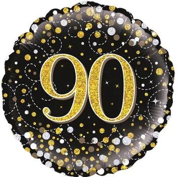 Decorative balloon with '90' in gold on a black background with confetti