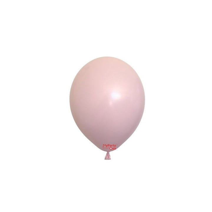 Single light pink balloon on a white background