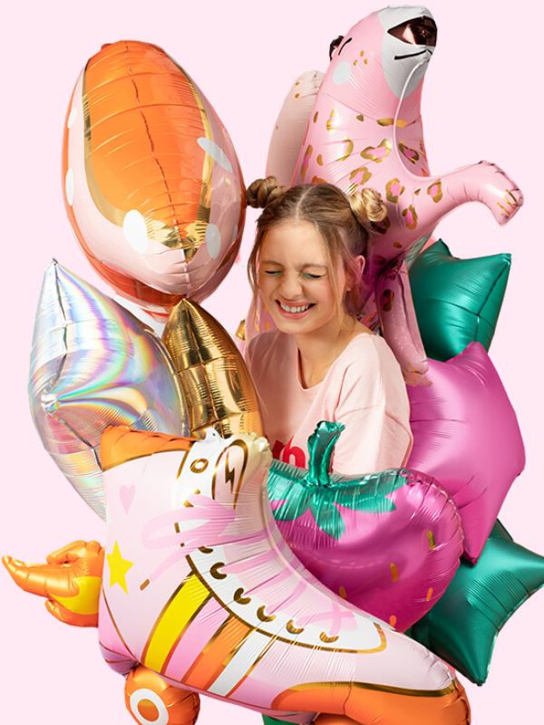 Assorted foil balloons with a girl