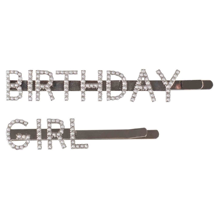 Two silver hair slides featuring "Birthday Girl" spelled out in small white pearls.