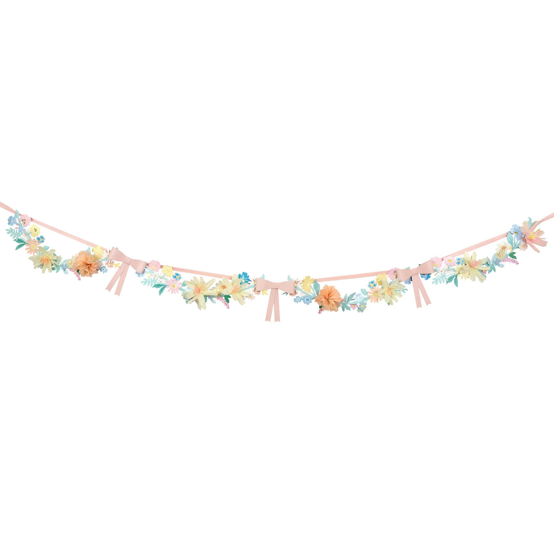 Floral and bow garland on a white background