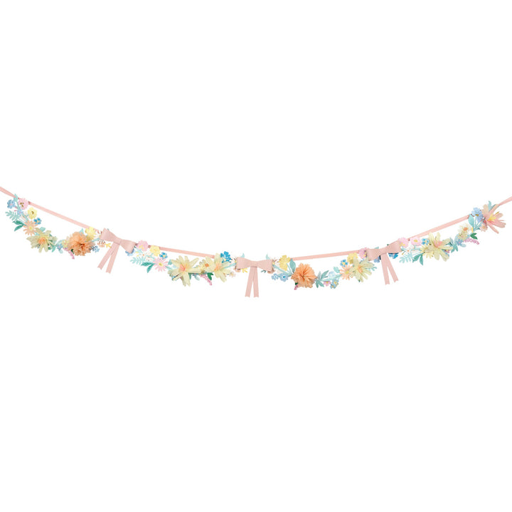 Floral and bow garland on a white background