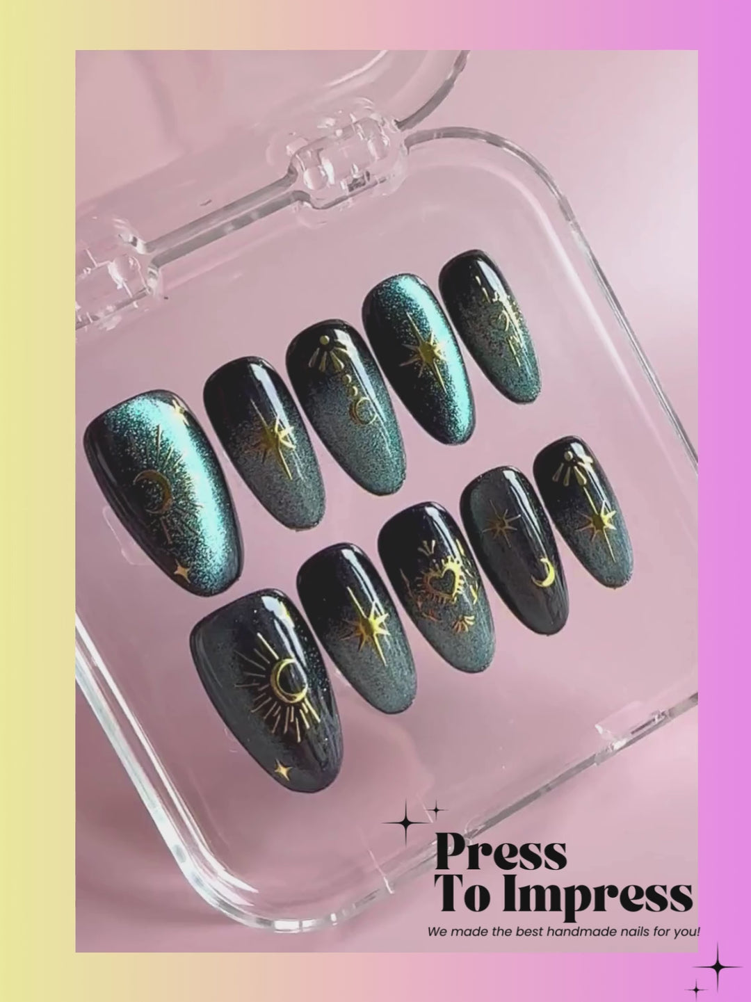 video shows A hand holds a clear plastic case containing 10 press-on nails with a celestial design. The nails feature a dark teal and black starry background with gold sun, moon, and star patterns.