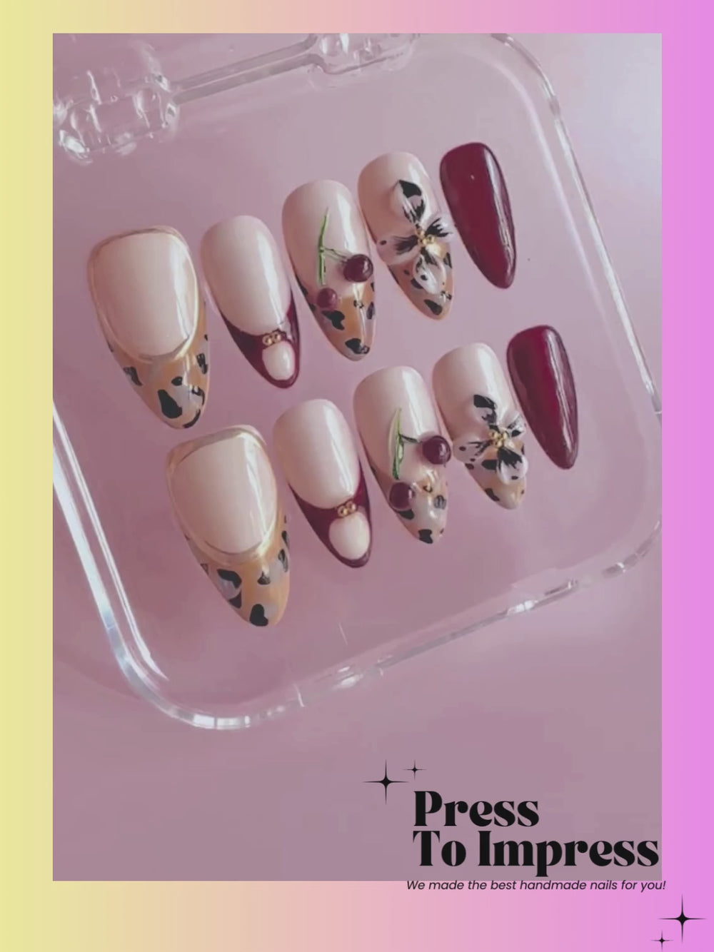A videos shows A hand holds a clear plastic case displaying press-on nails with cream, brown, and leopard-print designs, set against a pink and yellow gradient background with 'Press To Impress' branding.