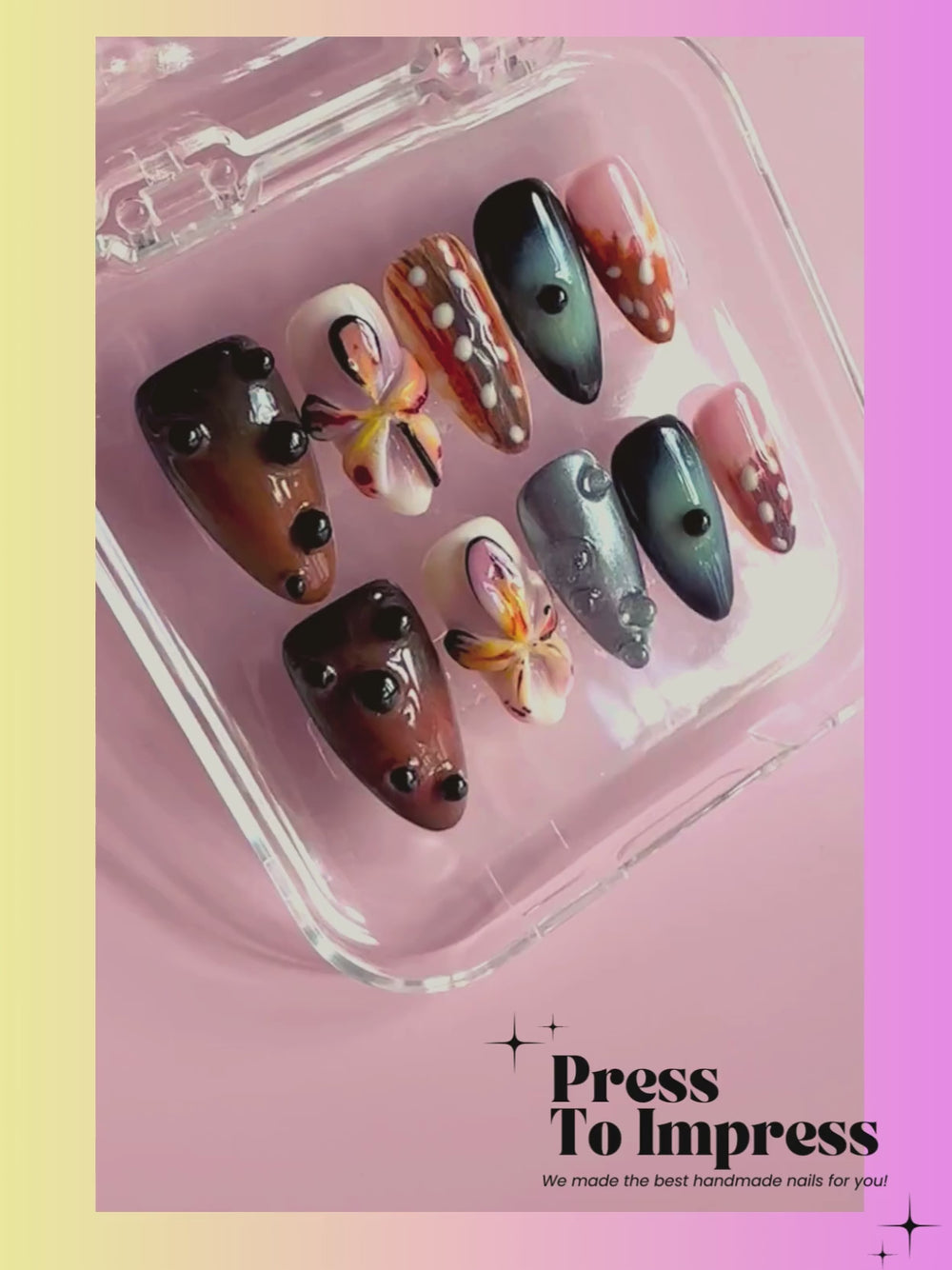 A video shows A hand holds a clear plastic case displaying press-on nails with various artistic designs, including leopard prints, watercolor textures, and glossy accents, against a pink and yellow gradient background with 'Press To Impress' text.