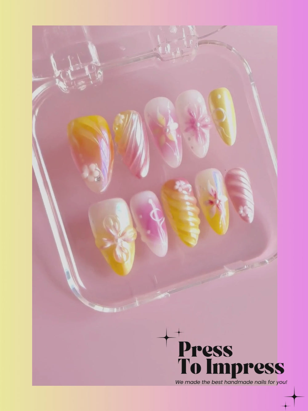 Video:A hand holds a clear plastic case containing 10 decorative press-on nails with pastel yellow, pink, and white floral and swirl designs. The background is a soft pink-to-yellow gradient with the text 'Press To Impress' and 'We made the best handmade nails for you!' at the top.