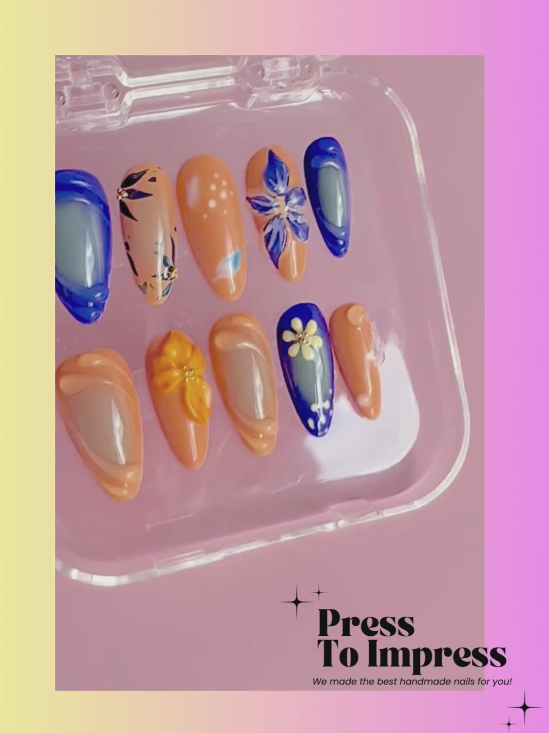 A Video shows A hand holds a clear plastic case displaying 10 decorative press-on nails. The nails feature floral and abstract designs in shades of blue, orange, yellow, and beige.
