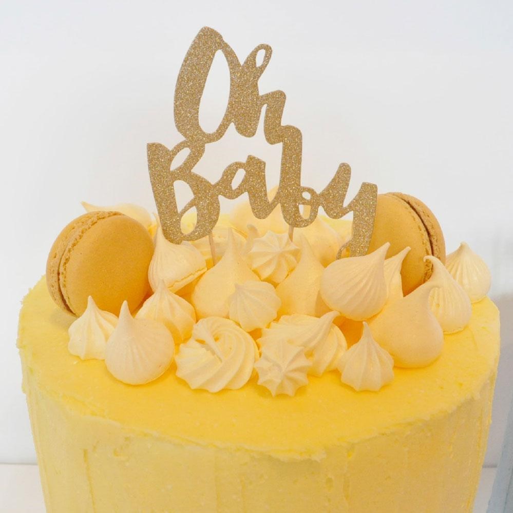 Illume Oh Baby Gold Glitter Cake Topper on cake