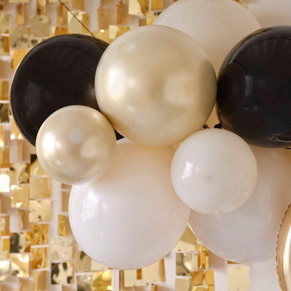 Milestone Balloon bunting decorations with mini foil numbers 30 and black, white and gold latex balloons