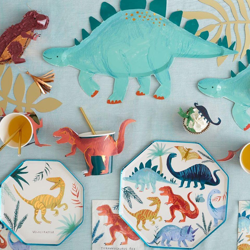 MeriMeri Dinosaur Kingdom Side Plates on table with other dinosaur theme party ware