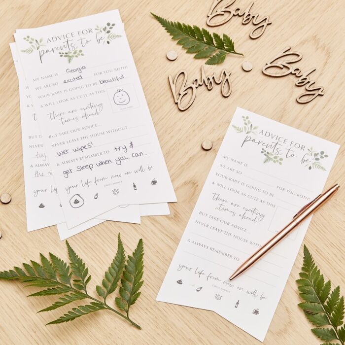 Ginger Ray Botanical Hey Baby Advice For the Parents Cards  on wooden table with baby confetti